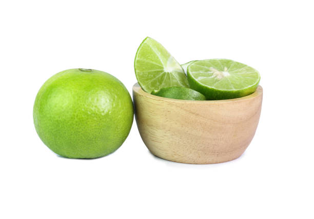 istock Fresh Limes with Cut in half with isolated white background 1322794888
