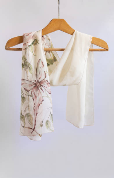 istock Scarf on the neck a woman's handkerchief on a white background 1322797846
