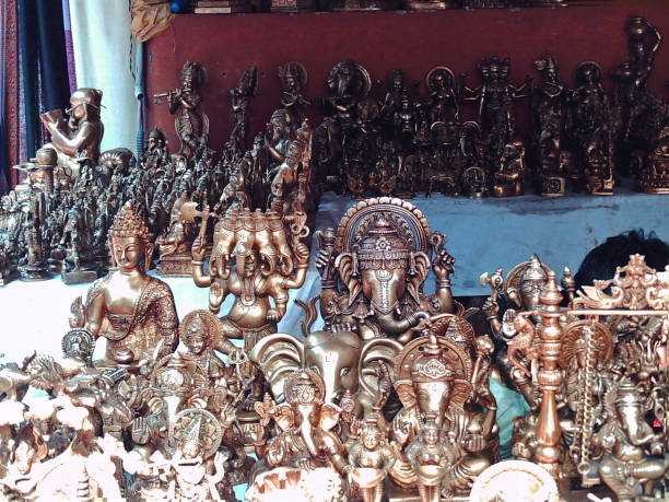 istock many brass idols and statues home decor display in shop 1322799220