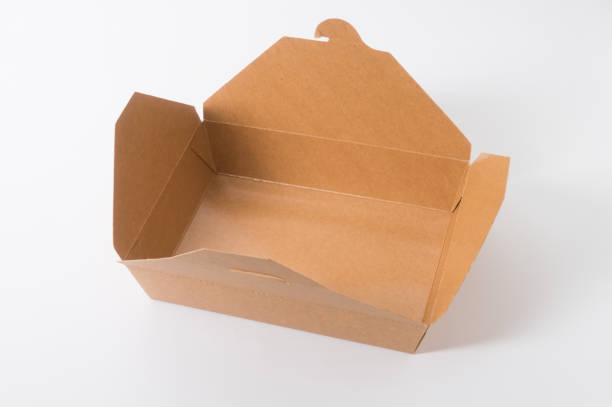 istock Opened empty lunch box with brown kraft paper 1322805634