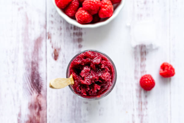istock Raspberry sorbet in a drinking glass 1322808767