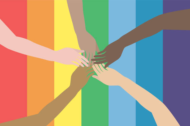 istock Different colour hands on rainbow Pride flag. Variety of hands connect on rainbow background. LGBTQ concept.  Equality and love protection. 1322810301