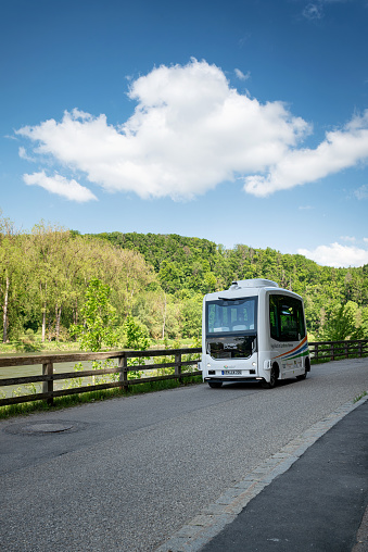 Kelheim, Bavaria, Germany. Autonomous driving in Kelheim. The Bavarian city of Kelheim is the first district in Germany to use two highly automated minibuses for public spaces in Kelheim and Abensberg. The speed of the electric bus is a maximum of 18 km / h. The bus has space for six passengers and a wheelchair space. It is free to use.