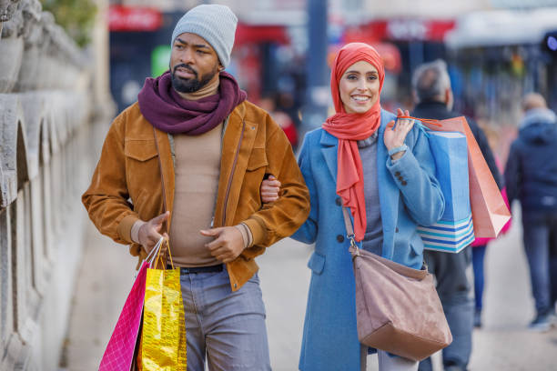 istock A Multi-Ethnic Couple is Enjoying in Relaxing Day for Shopping. 1322815013