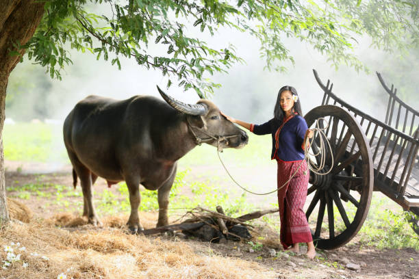 istock Woman Standing Against Plants 1322816189