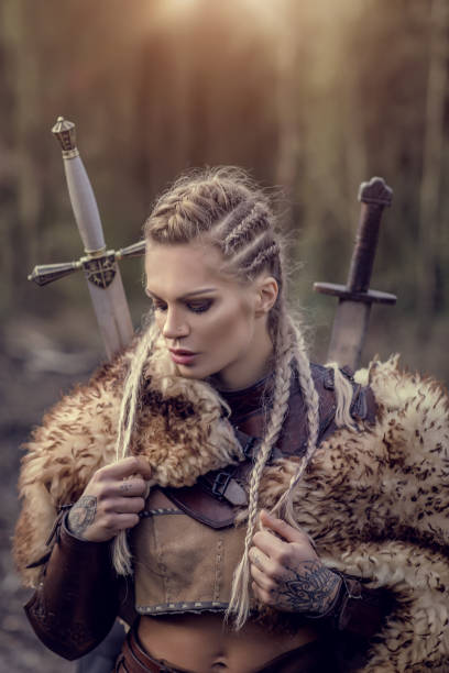 An individual viking woman outdoors in sunlight