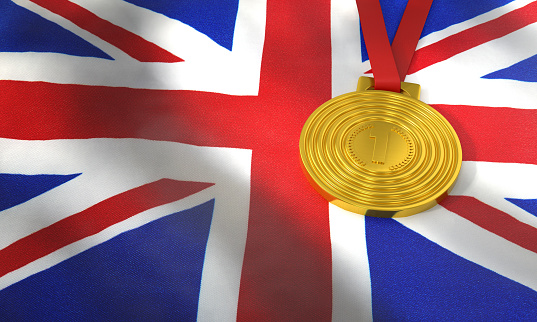 England flag and gold medal. International games and winning concept.