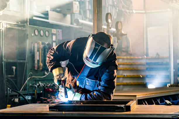 istock A welder welding in factory 1322822540