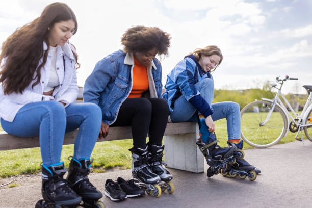 istock Multi-ethnic group of women wearing roller skates 1322824325