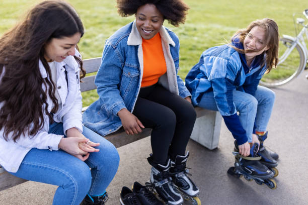istock Women getting ready for roller skating at Tempelhof airfield 1322824431