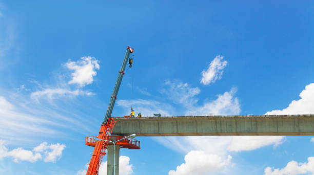 istock Workers are building an electric railway 1322825375