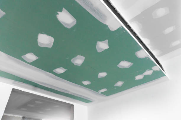 istock Process of ceiling house construction with gypsum board 1322825377