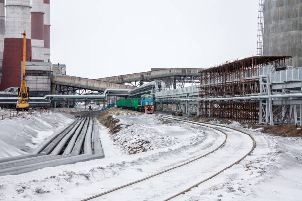 istock Industrial site with a railway in winter 1322825464