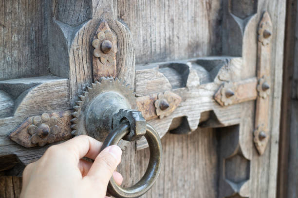 istock Old open wooden door with carved pattern 1322825745