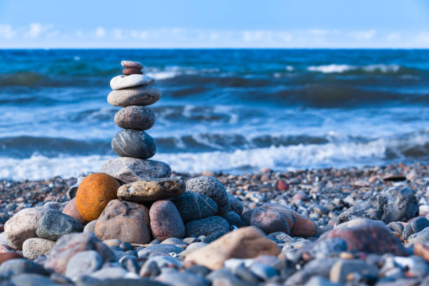 istock Pebble Stone Tower at Sea Shore 1322828374