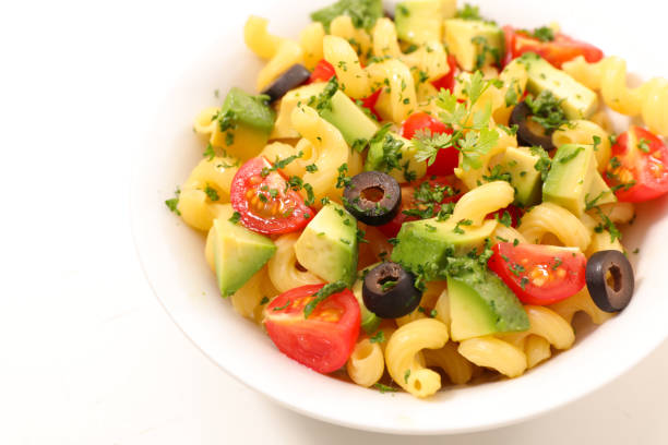 pasta salad with avocado, tomato and olive