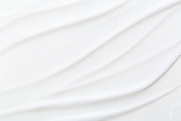 White Cosmetic Cream Isolated on White Background. Lipstick Smear. White Cosmetic Cream Isolated on White Background. Lipstick Smear. makeup swipes stock pictures, royalty-free photos & images