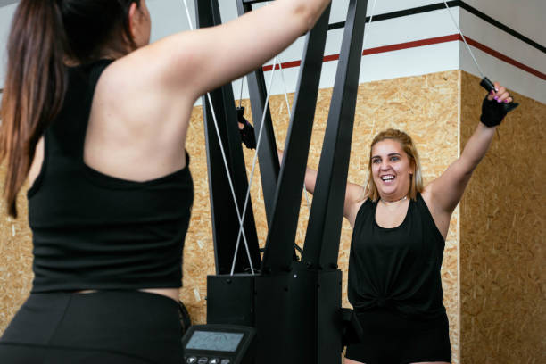 Athletic Girl Using Ski Machine During gym Workout