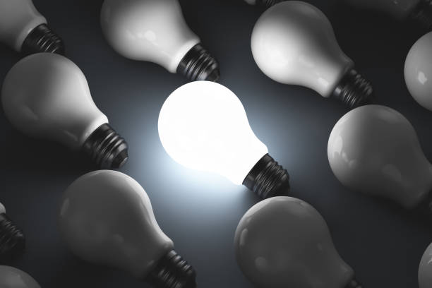 istock Light bulbs on the surface. One of the light bulbs is on. 1322831274