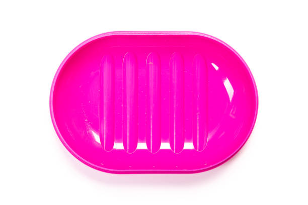 istock Soap in PLASTIC COLORED soap dish isolated on white background 1322832383
