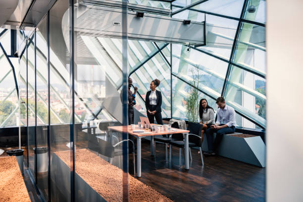 istock Happy business team having a standing meeting in office 1322836248