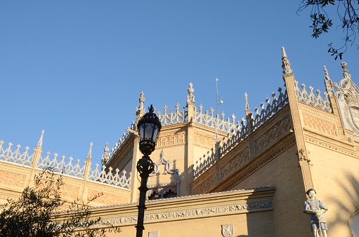 Top of Royal  Pavilion in park of Seville, Andalusia, Spain.