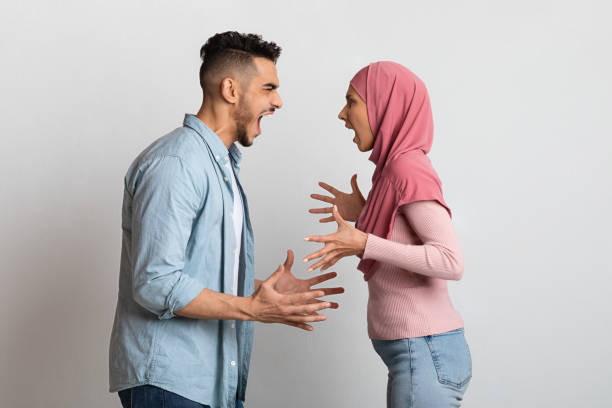 istock Relationship Crisis. Angry Islamic Spouses Shouting At Each Other With Rage 1322839698