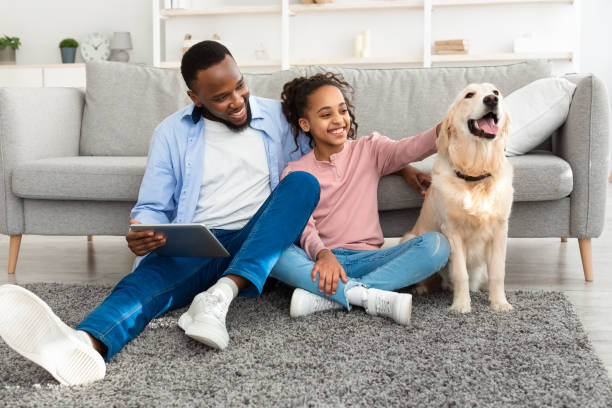 istock Black family spending time together at home 1322840034
