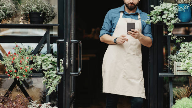 istock Modern devices for customer service in flower studio outdoor and online order 1322841171