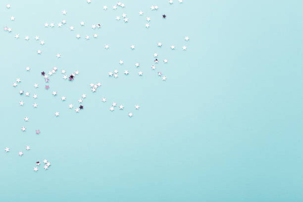 istock Purple stars on blue background 1322841556