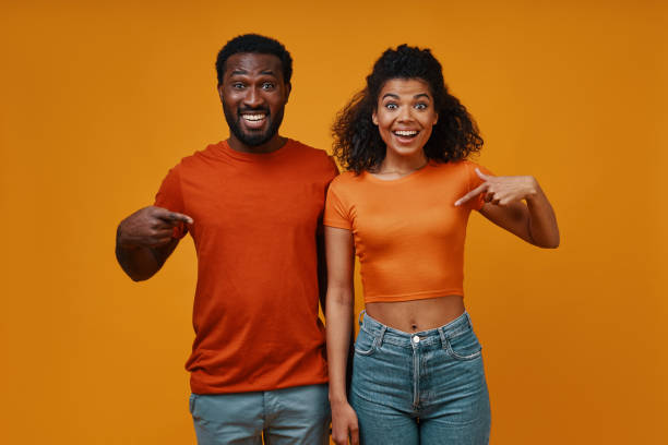 istock Beautiful young African couple gesturing and smiling 1322843904