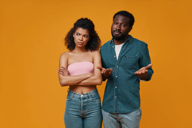 istock Young African couple gesturing and having a conflict 1322844021