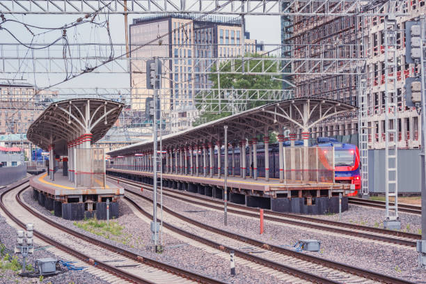 istock Electric train stands by the platform at sunset time. Moscow. 1322844380
