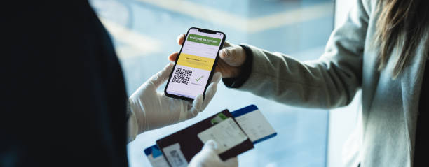 istock Tourist check in using immunity passport app in mobile phone for travel 1322844557