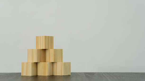 istock wooden blocks on a white background table empty cube for your own design 1322848495