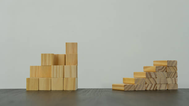 istock wooden stepped blocks laid on a white background table 1322848506