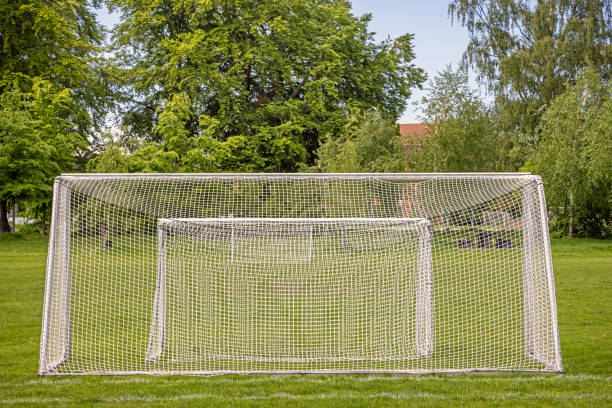 istock Soccer goals in a park 1322849640