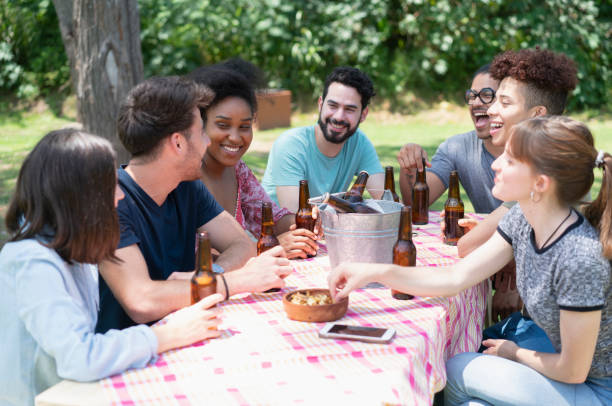 istock Friends having fun outside at the park 1322851392