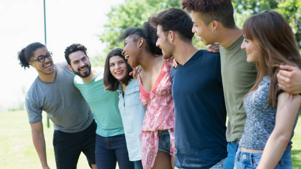 istock Friends having fun outside at the park 1322851515