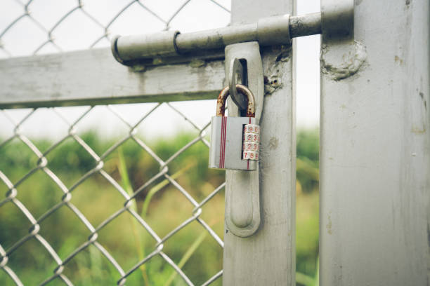 istock Number padlock on the iron door.soft focus. 1322851538