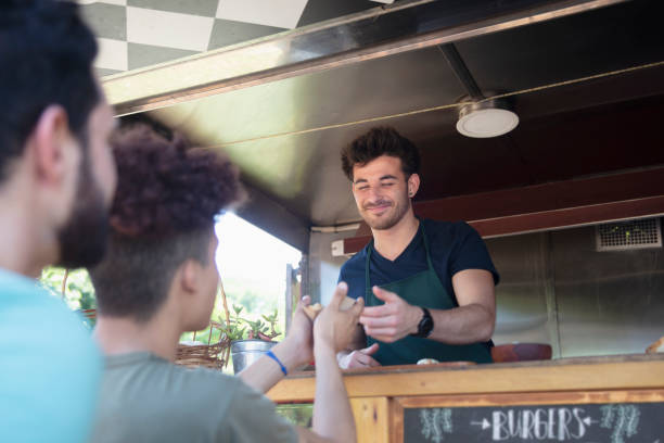 istock people working in a food truck 1322851611