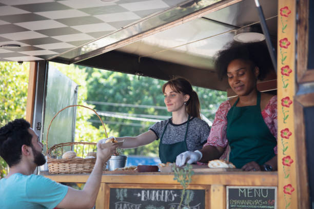 istock people working in a food truck 1322851646