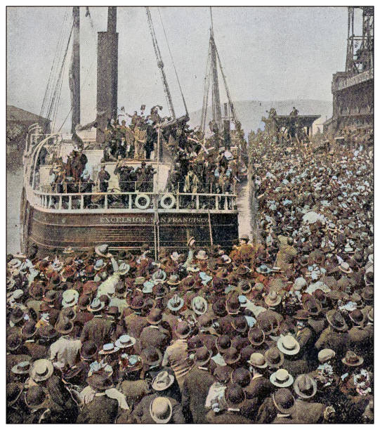 Antique photograph: Klondike gold rush, Ship full of miners leaving Vancouver Antique photograph: Klondike gold rush, Ship full of miners leaving Vancouver miner photos stock illustrations