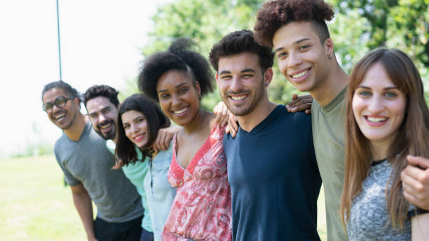 istock Friends having fun outside at the park 1322851693