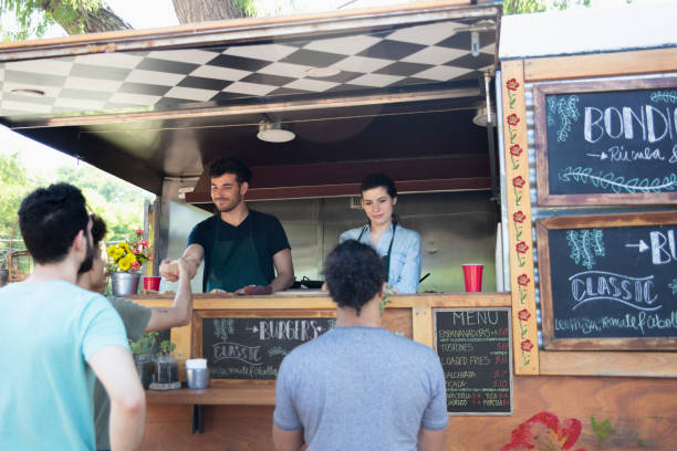 istock people working in a food truck 1322851695