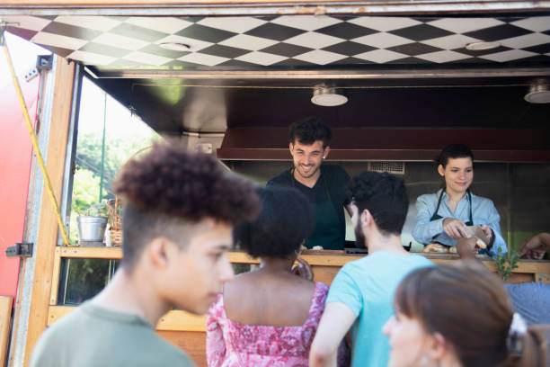 istock people working in a food truck 1322851697