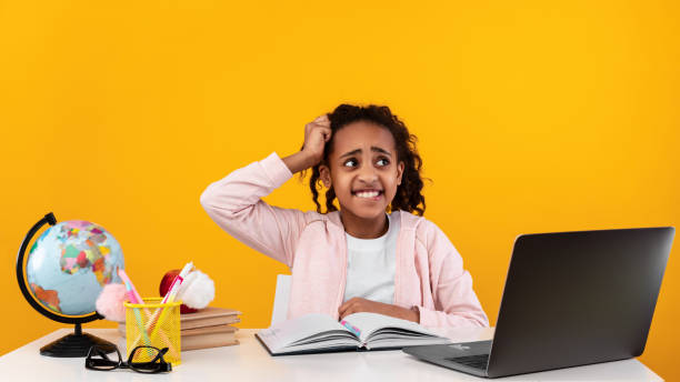 istock Shocked black girl grabbing head using laptop 1322853033