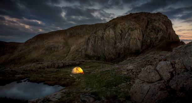 istock Wild Camping, Broadcrag Tarn, Mickledore, Scafell, English Lake District. 1322854708