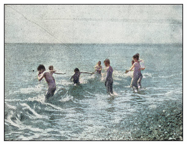 Antique photo: At the beach Antique photo: At the beach archival photos stock illustrations