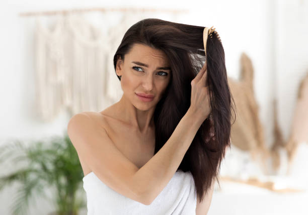 istock Losing hair and treatment. Upset and worry about beauty care problems, suffering from deficiency vitamins 1322855830